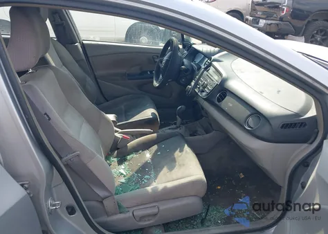 2011 Honda Insight Ex z USA, uszkodzony, nr VIN JHMZE2H7XBS007226